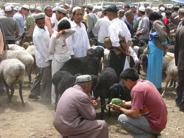 Kashgar, China - Locals at the Sunday Livestock Market