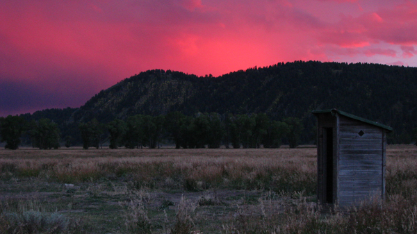 Wyoming - Mormon Row Outhouse before a Storm